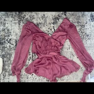 This is a beautiful cheshire LS play suit size xxs